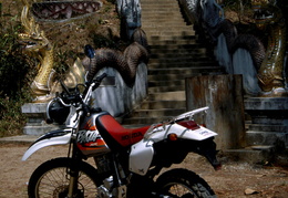 motorbike parked outside of a temple
