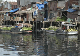 hauling cargo down the Saigon River