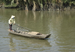 smaller paddle boat on the water