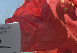 Chinese flags waving in support