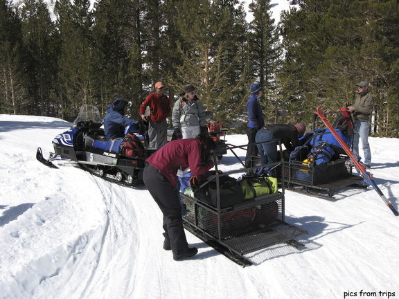 loading up the snowmobiles