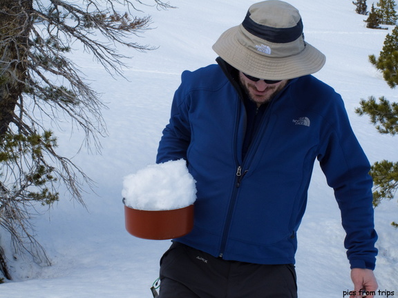 collecting snow to make water